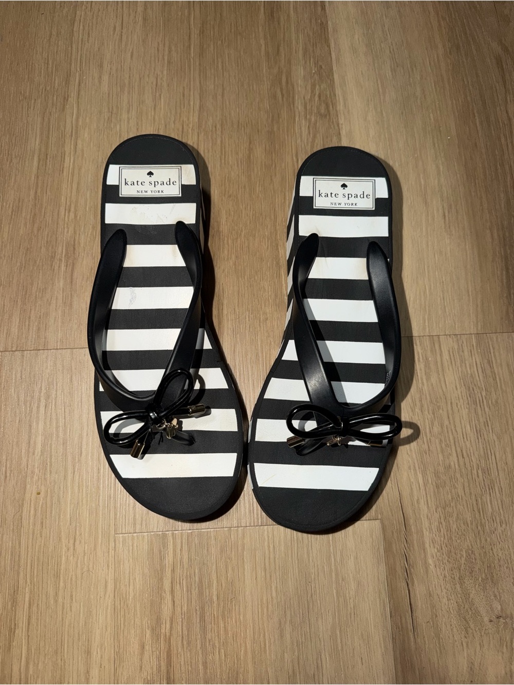 kate spade Black and White Striped Bow Flip Flop Sandals